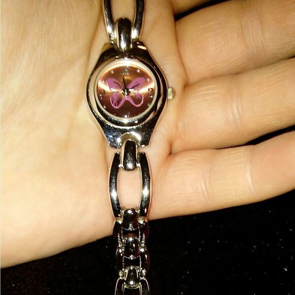 Silver Advance watch with round, pink face - Picture 1 of 8